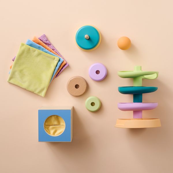 Baby sensory toys in a montessori play kit for 10 to 12 months from Petite Amélie