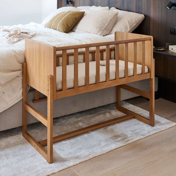 Bedside crib made from wood in walnut from Petite Amélie