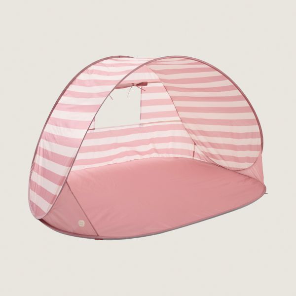 Pop up beach tent in pink as sunny day shelter from Petite Amélie