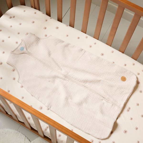 Sleeveless sleeping bag in beige muslin for 6 to 18 months from Petite Amélie 