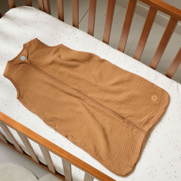 Sleeveless sleeping bag in caramel muslin for 6 to 18 months from Petite Amélie 