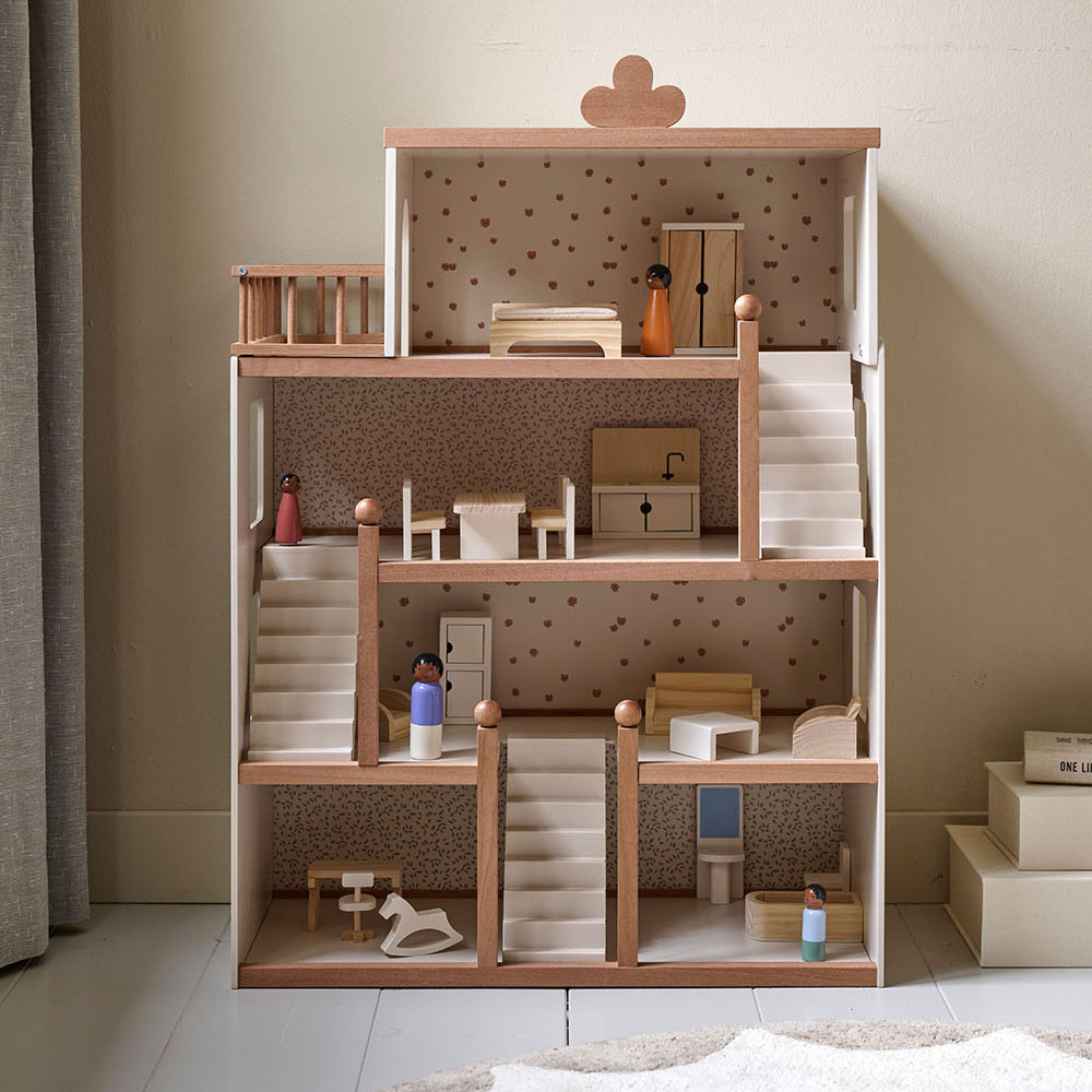Wooden dollhouses with furniture at Petite Amélie