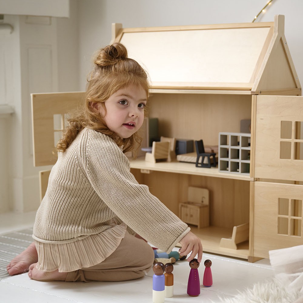 Wooden dollhouse toy with furniture from Petite Amélie